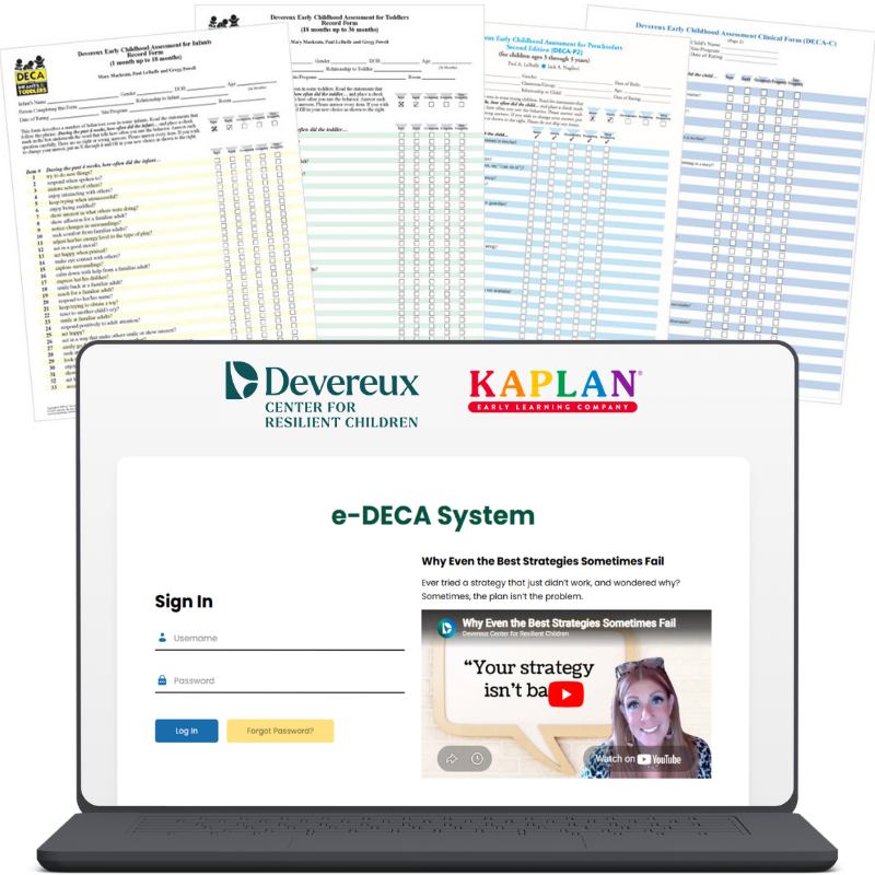 e-DECA open on laptop with paper assessments behind it.
